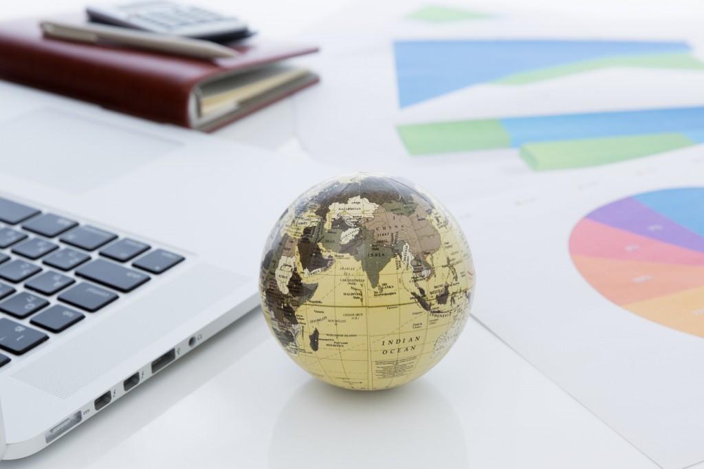 globe and business documents, terminology service is vital for international business